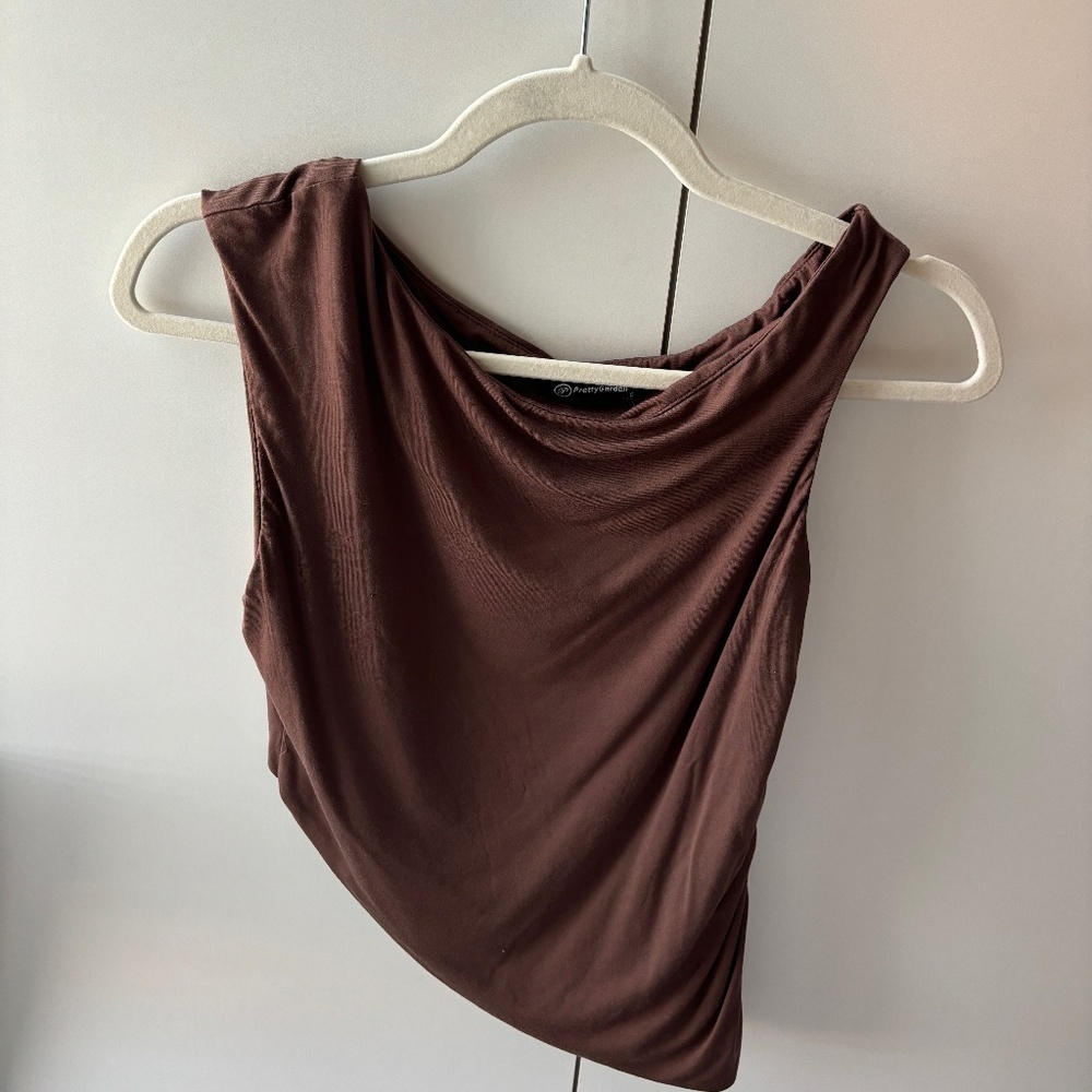 Brown, off one shoulder, going out top
